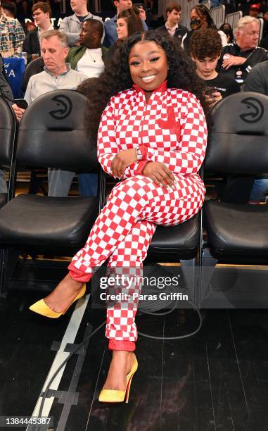 Singer Jekalyn Carr attends the game between the Los Angeles Clippers and the Atlanta Hawks at State Farm Arena on March 11, 2022 in Atlanta, Georgia.