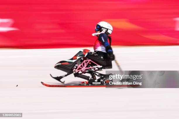 Momoka Muraoka of Team Japan competes in the Women's Slalom Sitting on day eight of the Beijing 2022 Winter Paralympics at Yanqing National Alpine...