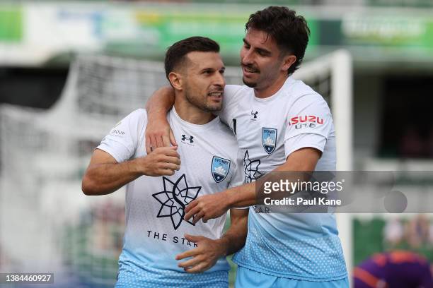 Kosta Barbarouses and Callum Talbot of Sydney celebrate a goal during the A-League Mens match between Perth Glory and Sydney FC at HBF Stadium, on...