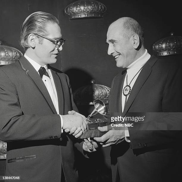 11th Annual Grammy Awards" -- Pictured: Grammy winner for "Best Jazz Performance, Small Group or Soloist With Small Group" Bill Evans, composer Henry...