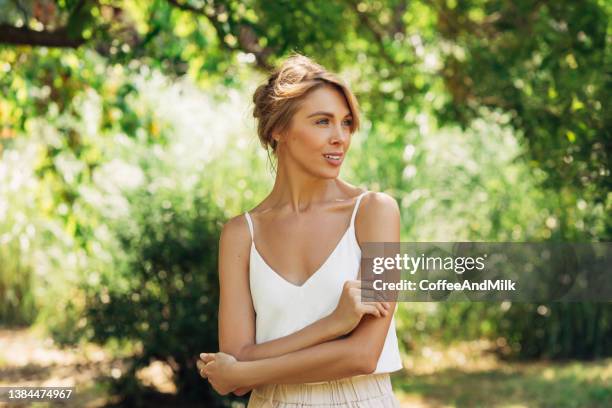 beautiful woman enjoying warm weather - hot female models stock pictures, royalty-free photos & images