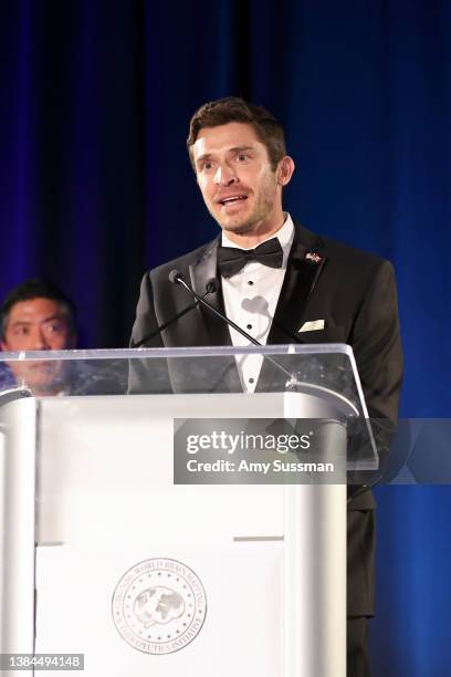 Justin Nahama speaks onstage during the 19th Annual "Gathering for a Cure" Black Tie Awards Gala of Brain Mapping Foundation at JW Marriott Los...