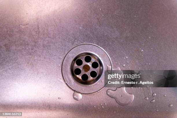 close up view of sink strainer - kitchen sink stock pictures, royalty-free photos & images