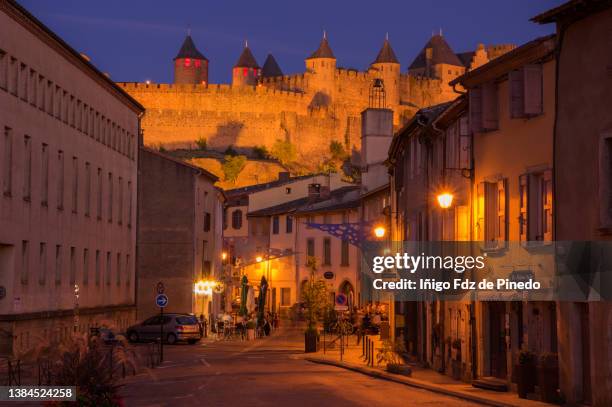 medieval city of carcassonne at night, occitanie, southern france. - carcassonne imagens e fotografias de stock