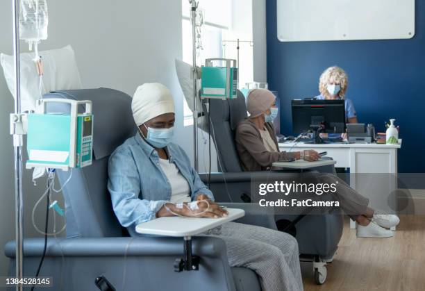 cancer patients receiving treatment - chemo stock pictures, royalty-free photos & images