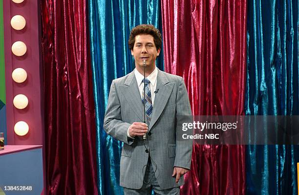 Episode 13 -- Air Date -- Pictured: Chris Parnell as Bert Convy during "Super Buzzers" skit on March 2, 2002