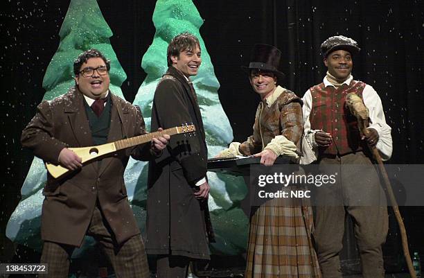 Episode 9 -- Air Date -- Pictured: Horatio Sanz as Tiny Tim's dad, Jimmy Fallon as Ebenezer Scrooge, Chris Kattan as Tiny Tim's Mom, Tracy Morgan as...