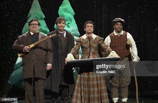 Episode 9 -- Air Date -- Pictured: Horatio Sanz as Tiny Tim's dad, Jimmy Fallon as Ebenezer Scrooge, Chris Kattan as Tiny Tim's Mom, Tracy Morgan as...