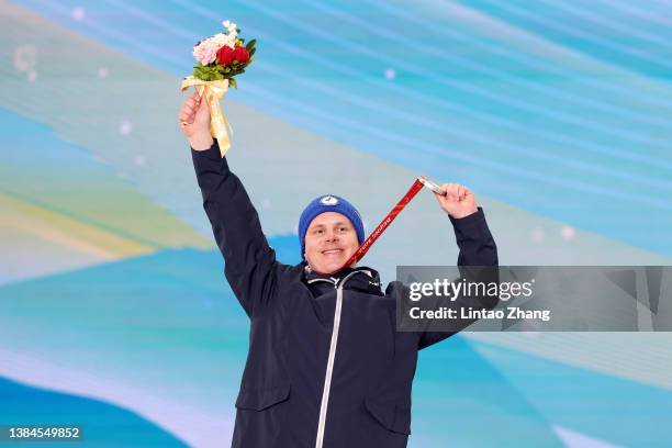 Silver medalist Matti Suur-Hamari of Team Finland celebrate on the podium during the medal ceremony for the Men's Banked Slalom SB-LL2 on day eight...