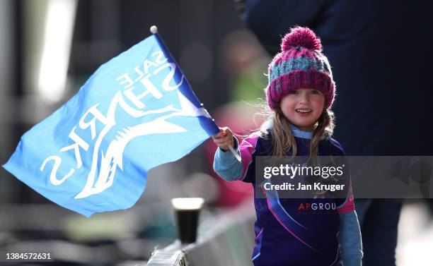 Young Sharks fan looks on during the Gallagher Premiership Rugby match between Sale Sharks and Gloucester Rugby at AJ Bell Stadium on March 12, 2022...