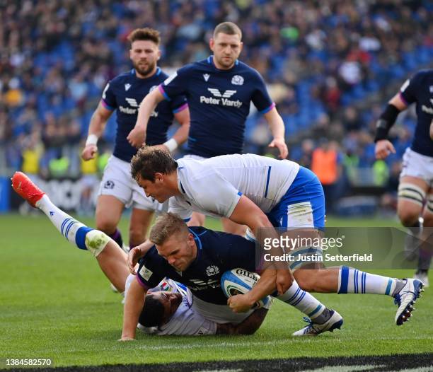Chris Harris of Scotland touches down for the third try during the Guinness Six Nations Rugby match between Italy and Scotland at Stadio Olimpico on...