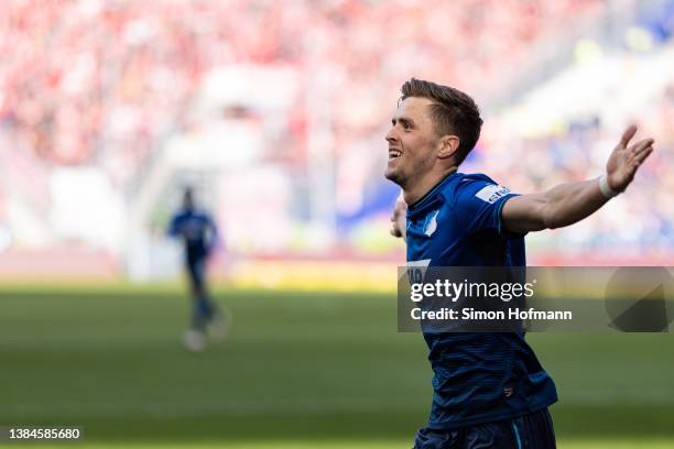 Christoph Baumgartner of Hoffenheim celebrates his side's first goal during the Bundesliga match between TSG Hoffenheim and FC Bayern München at...