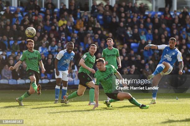 Jonson Clarke-Harris of Peterborough United scores his team's first goal during the Sky Bet Championship match between Peterborough United and Stoke...