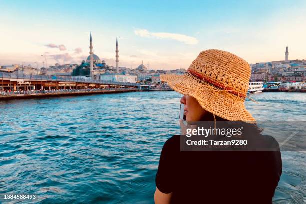 female model taking photos in istanbul, turkey - istanbul sunset stock pictures, royalty-free photos & images