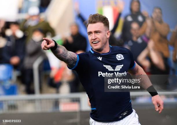 Stuart Hogg of Scotland celebrates after scoring a try during the Guinness Six Nations Rugby match between Italy and Scotland at Stadio Olimpico on...