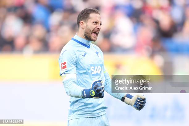 Oliver Baumann of TSG 1899 Hoffenheim celebrates at the full time whistle during the Bundesliga match between TSG Hoffenheim and FC Bayern München at...