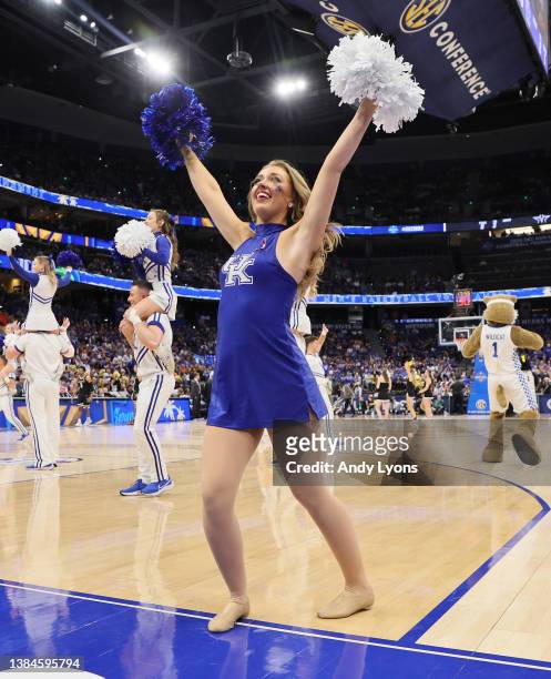Kentucky Wildcats cheerleader in the game against the Vanderbilt Commodores during the quarterfinals of the 2022 SEC Men's Basketball Tournament at...