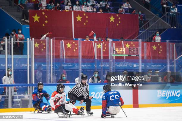 Team China against Team South Korea action during the Para Ice Hockey Bronze Medal Game on day eight of the Beijing 2022 Winter Paralympics at...