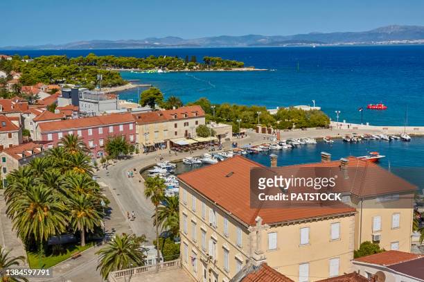 high angle view on town of supetar from bell tower of church of the annunciation, brac island, croatia. - brac eiland stockfoto's en -beelden