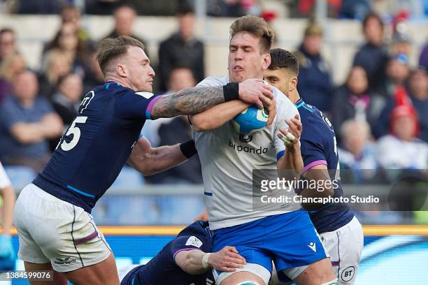 Federico Ruzza of Italy competes for the ball with Stuart Hogg of Scotland during the Guinness Six Nations Rugby match between Italy and Scotland at...