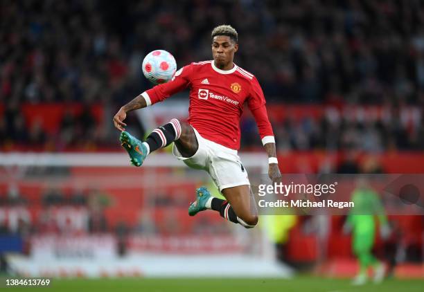 Marcus Rashford of Manchester United controls the ball in the air during the Premier League match between Manchester United and Tottenham Hotspur at...
