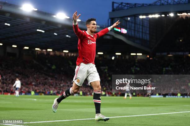 Cristiano Ronaldo of Manchester United celebrates after scoring their side's second goal during the Premier League match between Manchester United...