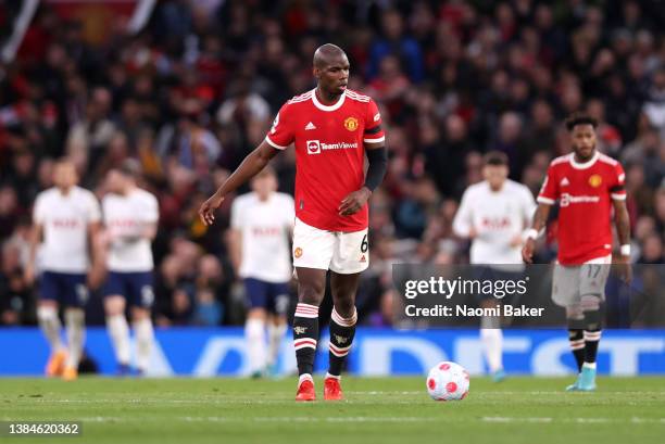 Paul Pogba of Manchester United looks on dejected after their side concedes a goal scored by Harry Kane of Tottenham Hotspur during the Premier...