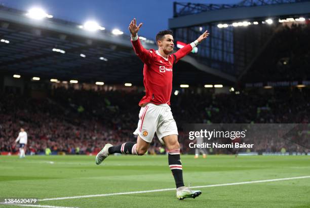 Cristiano Ronaldo of Manchester United celebrates after scoring their side's second goal during the Premier League match between Manchester United...