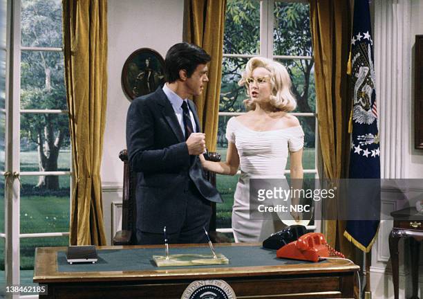 Episode 5 -- Air Date -- Pictured: Joe Piscopo as President John F. Kennedy, Teri Garr as Marilyn Monroe during "Kennedy: Man Behind The Woman!" skit...