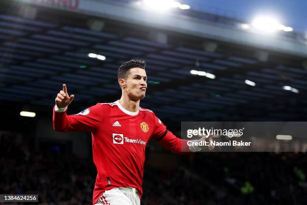 Cristiano Ronaldo of Manchester United celebrates after scoring their side's second goal during the Premier League match between Manchester United...