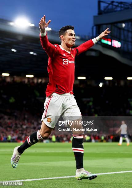 Cristiano Ronaldo of Manchester United celebrates after scoring their side's second goal during the Premier League match between Manchester United...