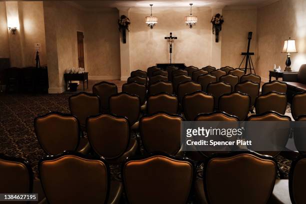 Empty seats are seen at the Gerald Neufeld Funeral Home, which had been overwhelmed with the deceased during the Covid-19 pandemic, has now returned...