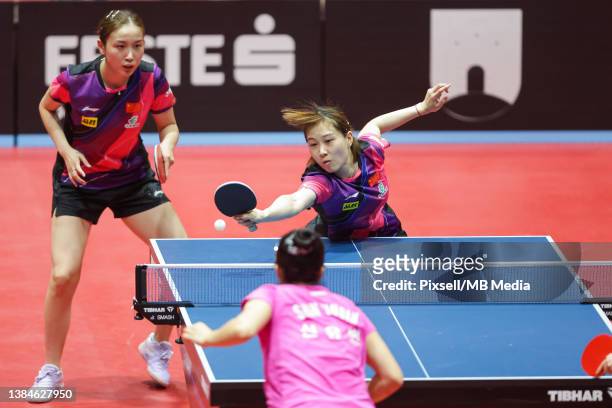 Qian Tianyi and Liu Weishan of China compete during Women's Doubles final match between Shin Yubin/Jeon Jihee of South Korea and Liu Weishan/Qian...