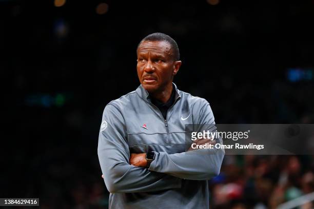 Dwane Casey Head coach of the Detroit Pistons looks on during the fourth quarter of the game against the Boston Celtics at TD Garden on March 11,...