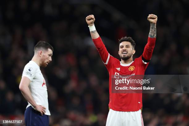 Alex Telles of Manchester United celebrates their sides victory after the Premier League match between Manchester United and Tottenham Hotspur at Old...