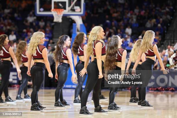 Texas A&M Aggies cheerleaders perform during a timeout during the second half against the Arkansas Razorbacks in the Semifinal game of the SEC Men's...