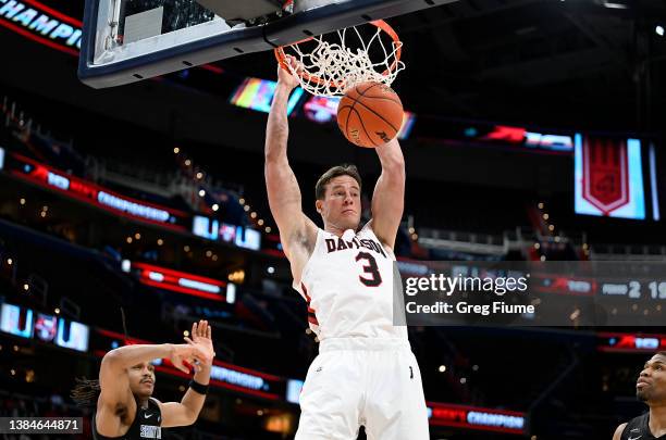 Sam Mennenga of the Davidson Wildcats dunks the ball in the second half against the Saint Louis Billikens during the 2022 Atlantic 10 Men's...