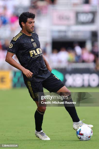 Carlos Vela of Los Angeles FC dribbles with the ball against Inter Miami CF during the second half at DRV PNK Stadium on March 12, 2022 in Fort...