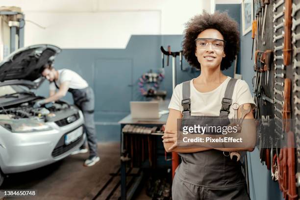 portrait of female car mechanic - dirty women pics stock pictures, royalty-free photos & images