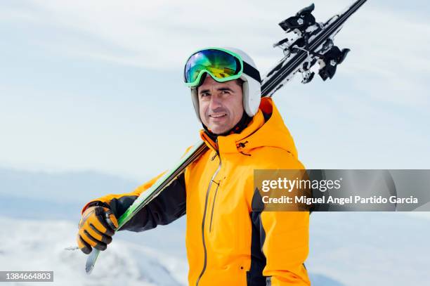 man on skis looking sideways - andalucian sierra nevada stock pictures, royalty-free photos & images