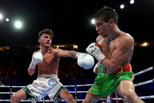 Leigh Wood punches Michael Conlan during the WBA World Featherweight Title fight between Leigh Wood and Michael Conlan at Motorpoint Arena Nottingham...