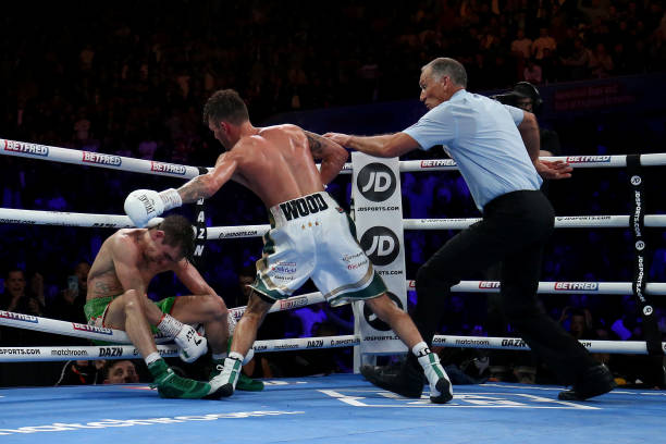 Leigh Wood knocks out Michael Conlan during the WBA World Featherweight Title fight between Leigh Wood and Michael Conlan at Motorpoint Arena...