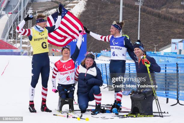 March 13:Oksana Masters,Sydney Peterson,Daniel Cnosse and Jake Adicoff of Team United States after the goal of Cross-Country Skiing Mixed 4×2.5Km...