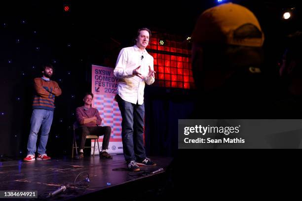 John Gemberling, Matt Besser, and Anthony Atamanuik onstage at 'Upright Citizens Brigade's ASSSSCAT' during the 2022 SXSW Conference and Festivals at...