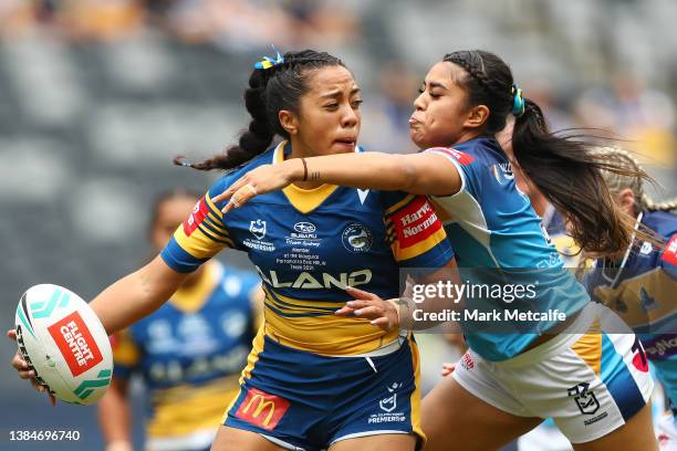 Christine Pauli of the Eels is tackled during the round three NRLW match between the Parramatta Eels and the Gold Coast Titans at CommBank Stadium,...