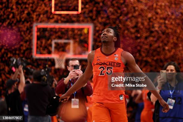 Justyn Mutts of the Virginia Tech Hokies celebrates after defeating the Duke Blue Devils to win the 2022 Men's ACC Basketball Tournament -...