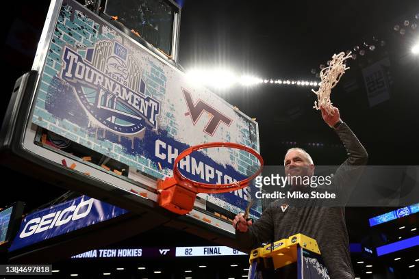 Head coach Mike Young of the Virginia Tech Hokies celebrates after defeating the Duke Blue Devils to win the 2022 Men's ACC Basketball Tournament -...
