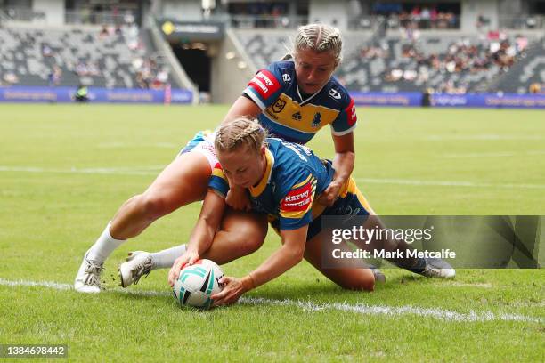 Abbi Church of the Eels scores a try during the round three NRLW match between the Parramatta Eels and the Gold Coast Titans at CommBank Stadium, on...