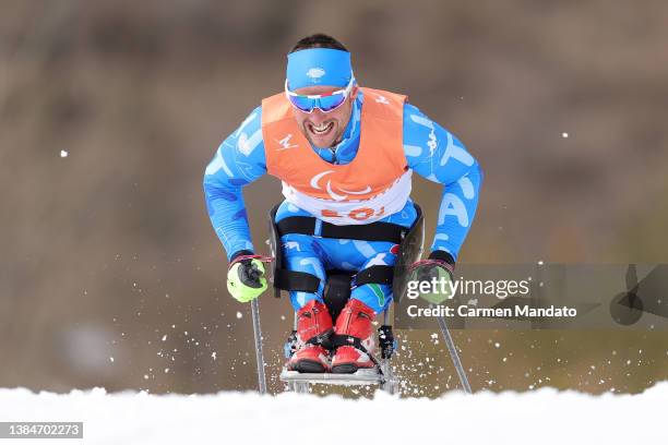 Giuseppe Romele of Team Italy competes in the Para Cross-Country Open 4x2.5km Relay during day nine of the Beijing 2022 Winter Paralympics at...