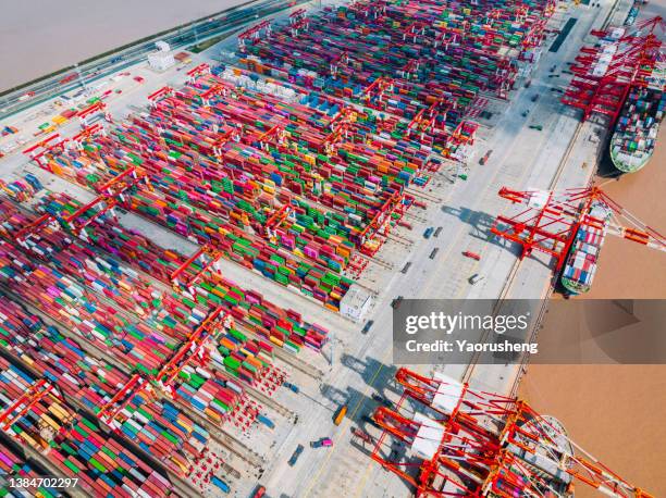 aerial view of shanghai yangshan deep water port - shipping containers green red stock pictures, royalty-free photos & images